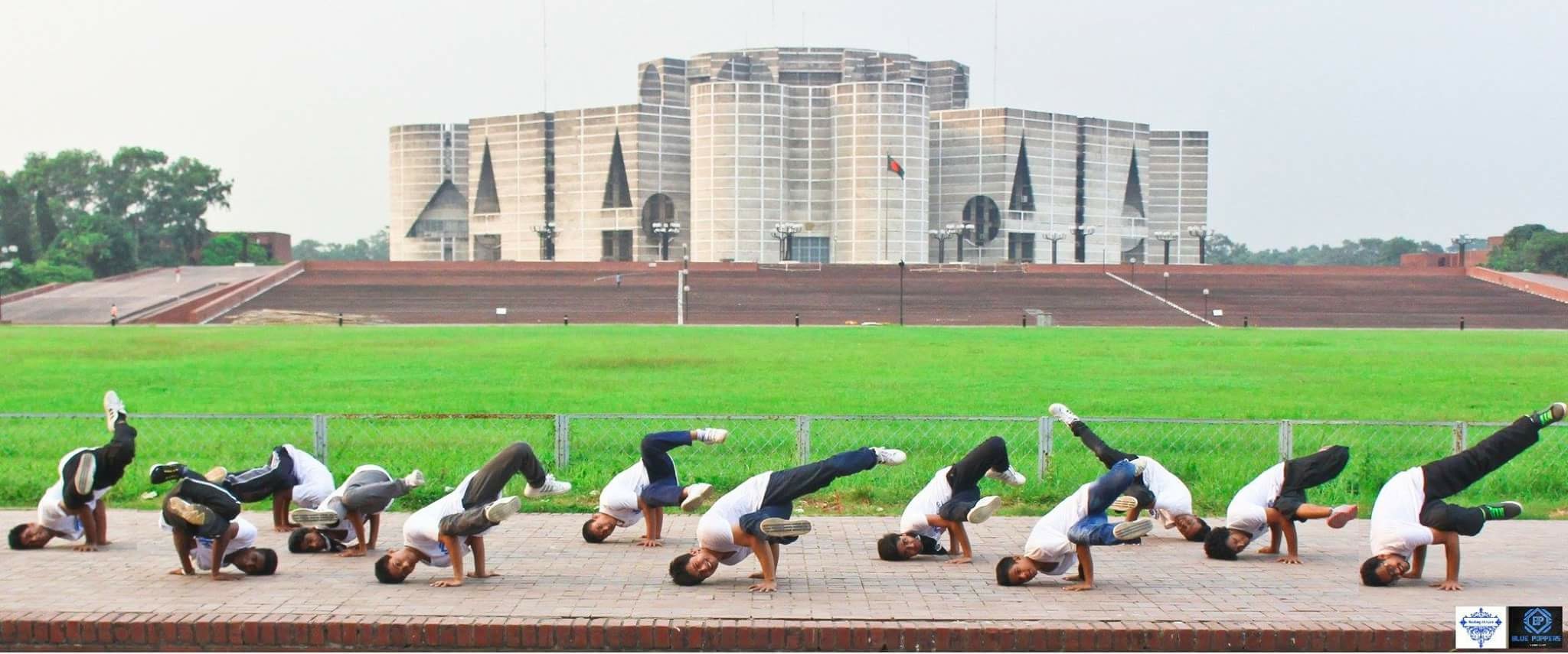 The blue poppers crew, in front of the parliament building of Bangladesh. 